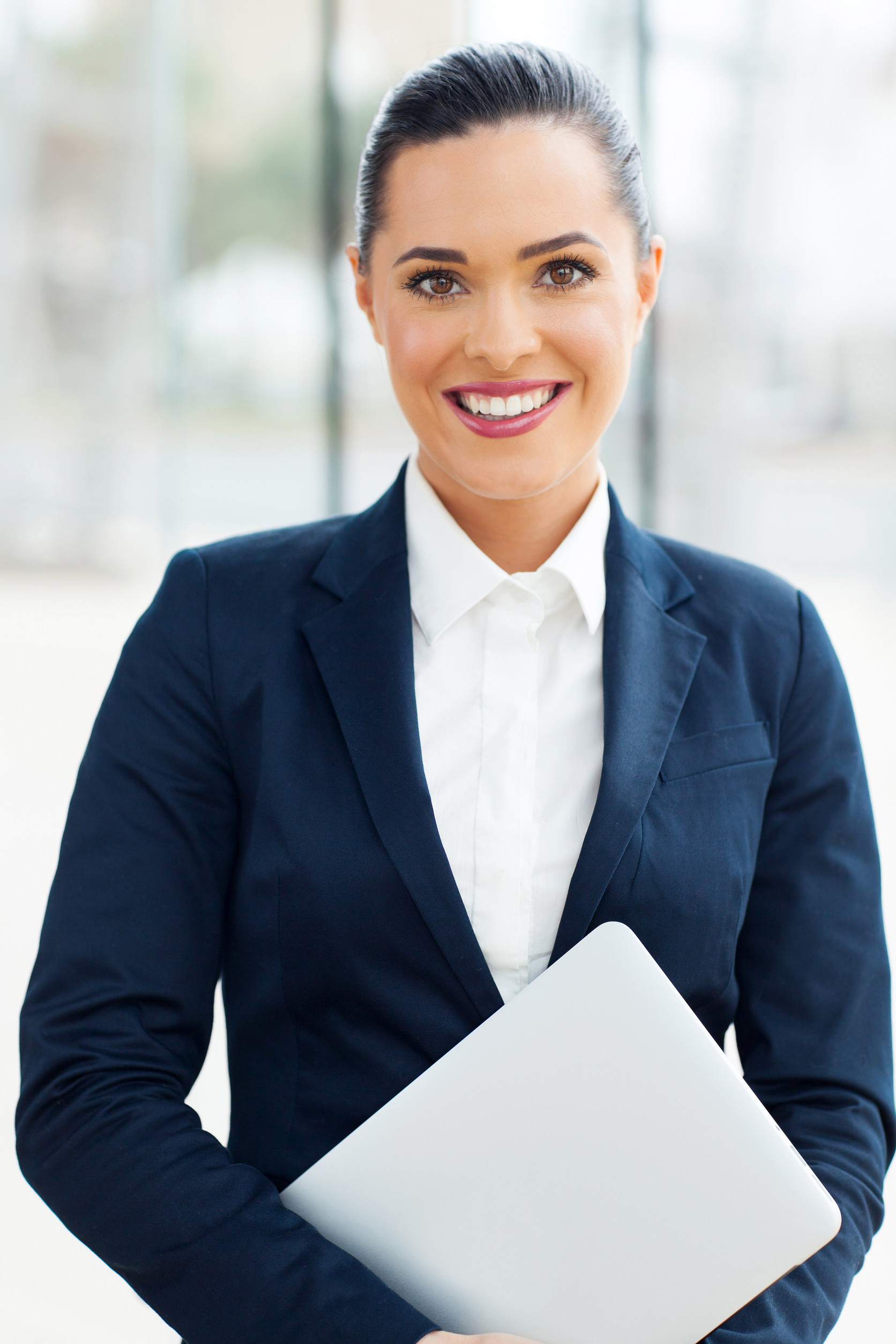 beautiful young corporate worker in modern office